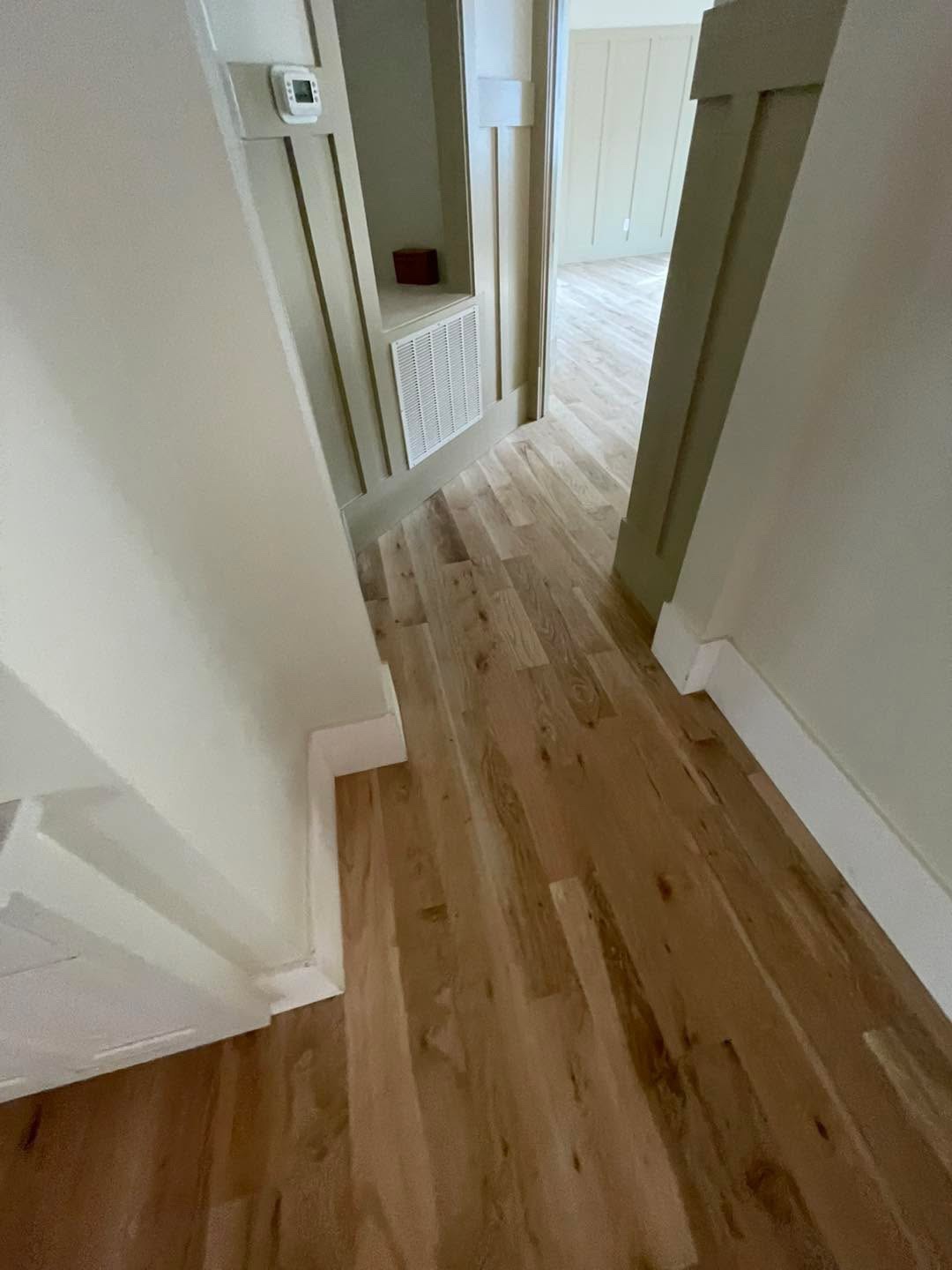 Finished light floor in hallway