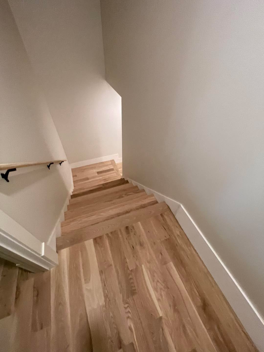Newly installed light wood staircase