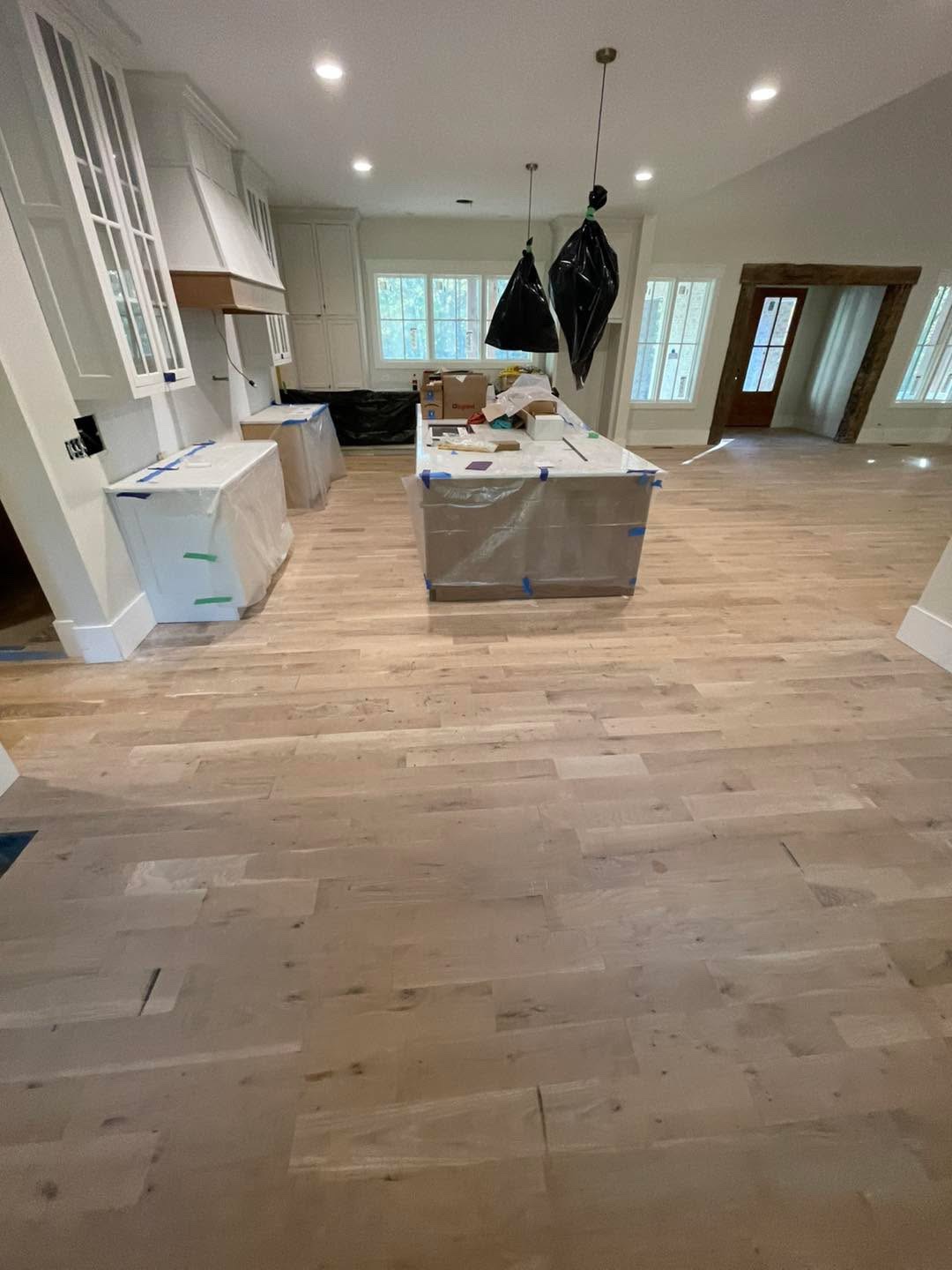 Finished light floor in kitchen and living area